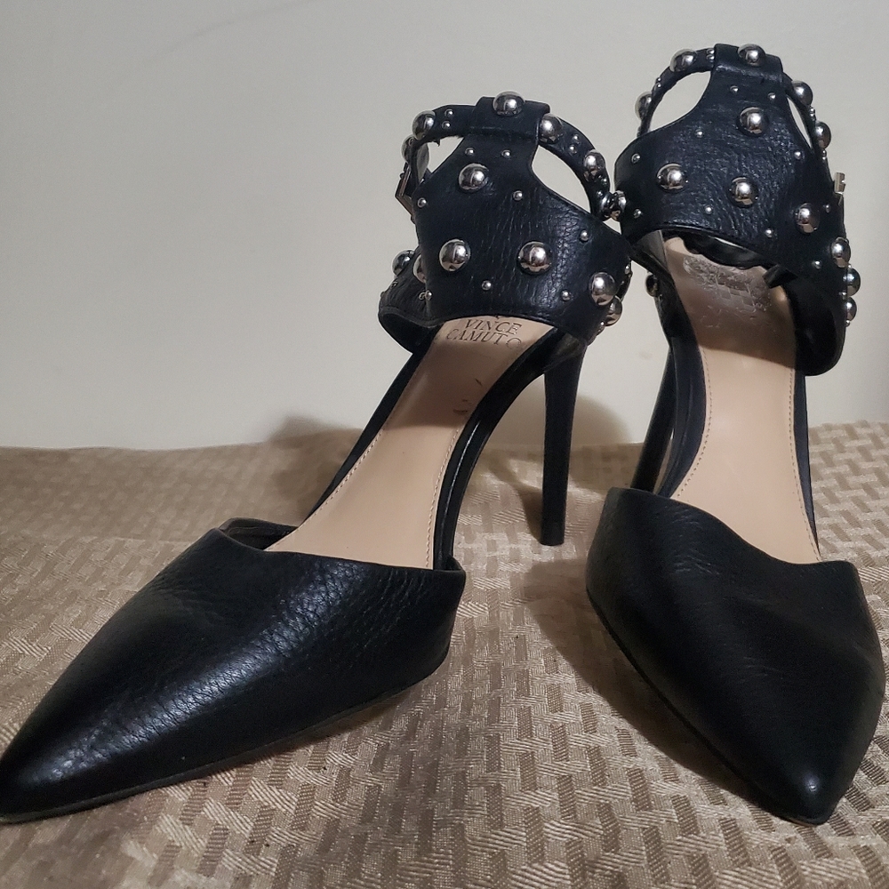 Studded black high-heeled pointed toe shoe
